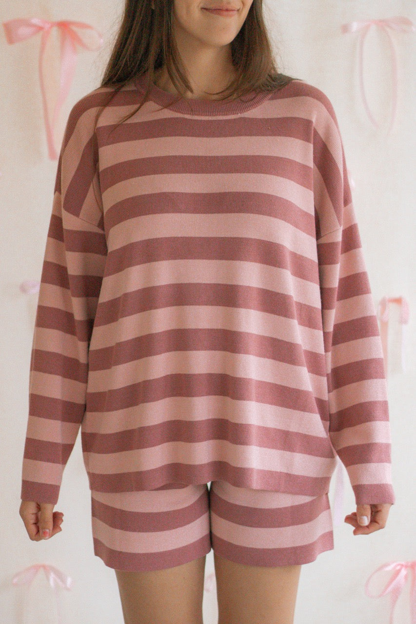 A pink and mauve striped soft knit sweater matching set with a long sleeve top and shorts