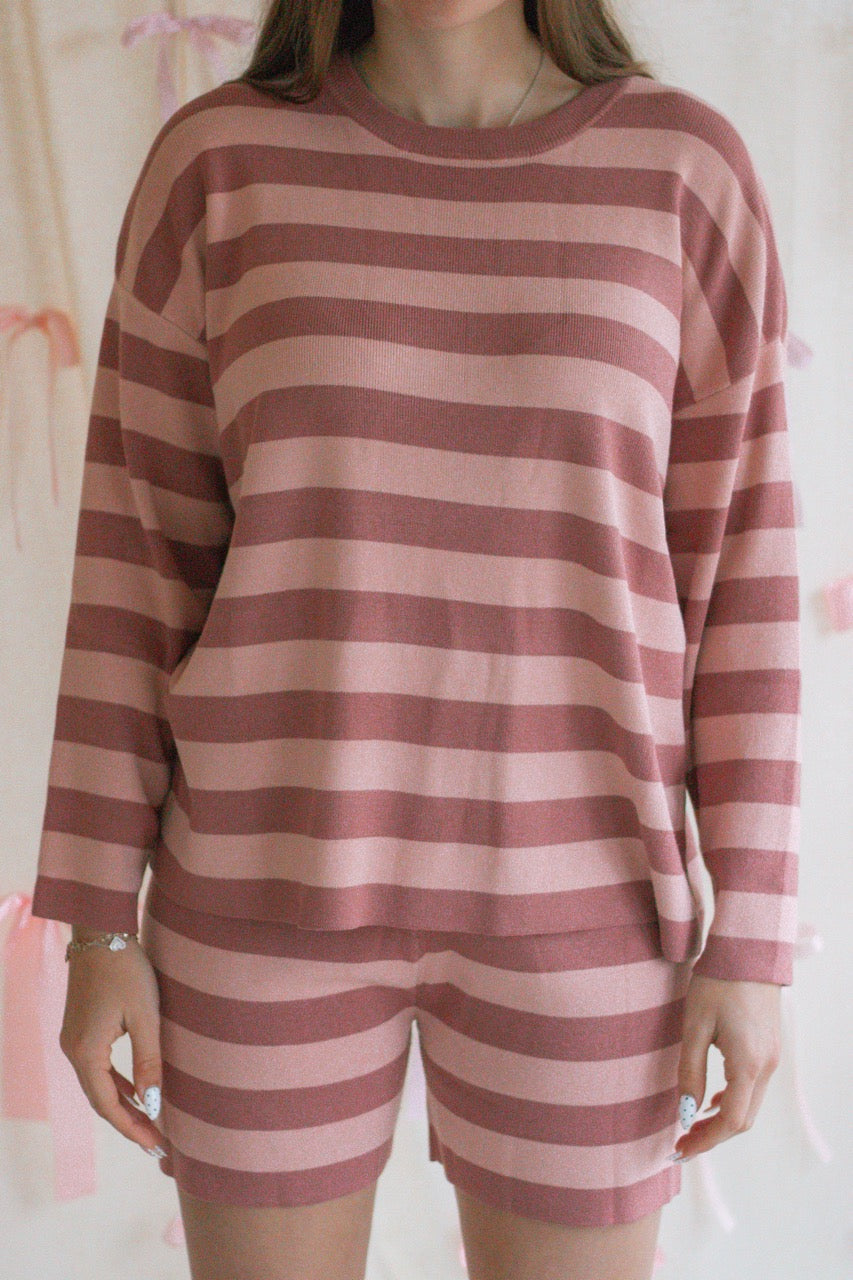 A pink and mauve striped soft knit sweater matching set with a long sleeve top and shorts